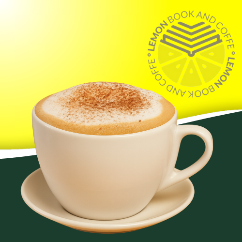 Café capuchino servido en Lemon Book and Coffe, con espuma cremosa y un toque perfecto en Murcia.