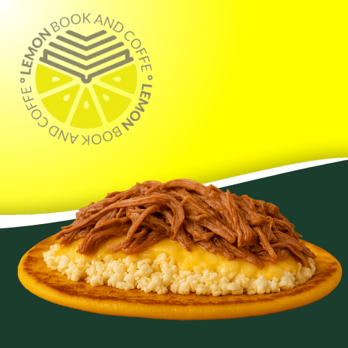 Cachapa rellena de carne mechada y queso gouda, un plato venezolano único